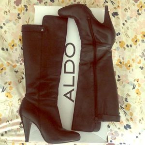 Knee high leather heeled boots